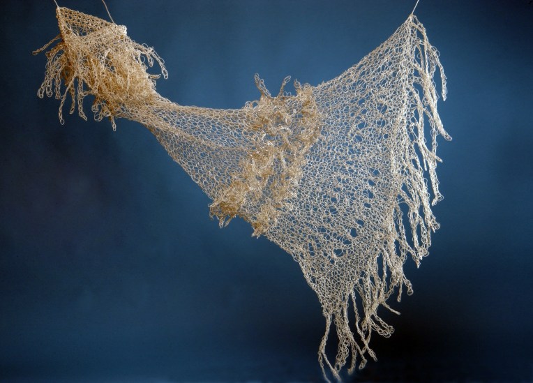 Knitted installtion, outdoor setting.